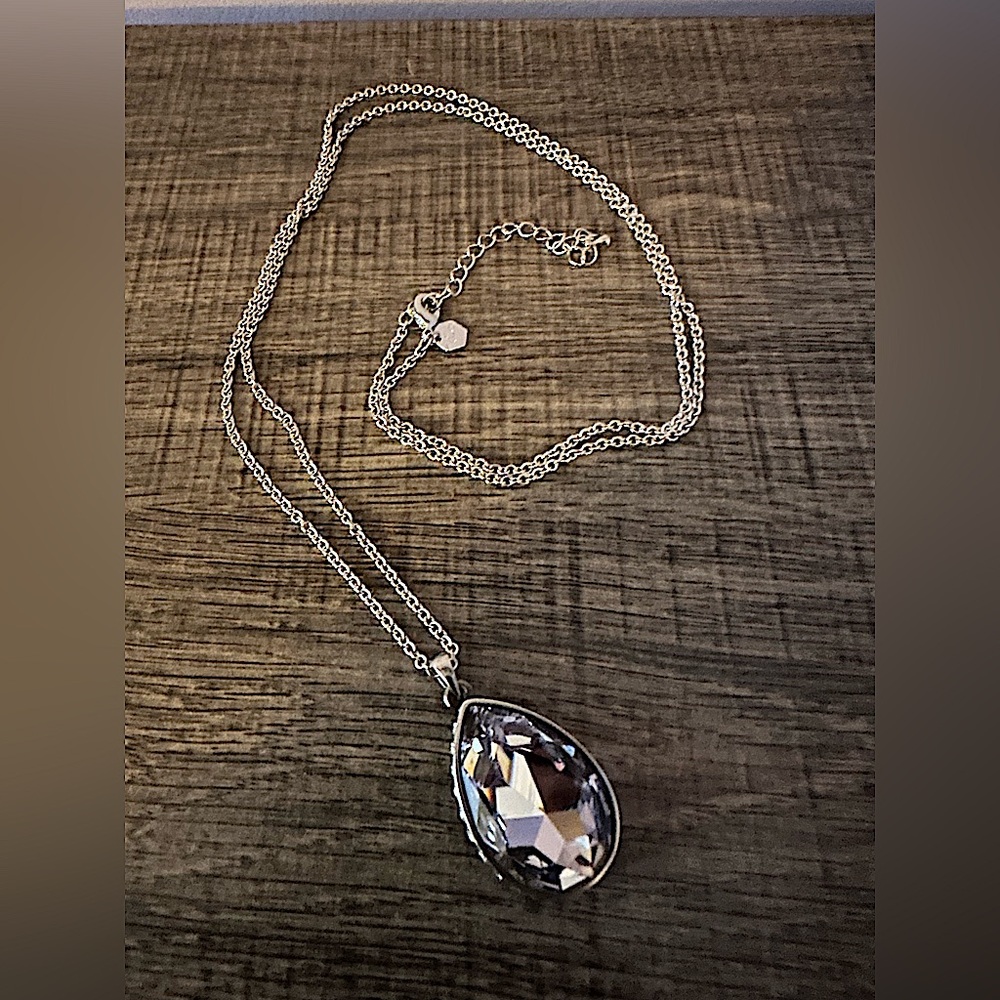 Touchstone Crystal lavender crystal pendant.
